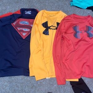 three under armour small long sleeve loose shirts